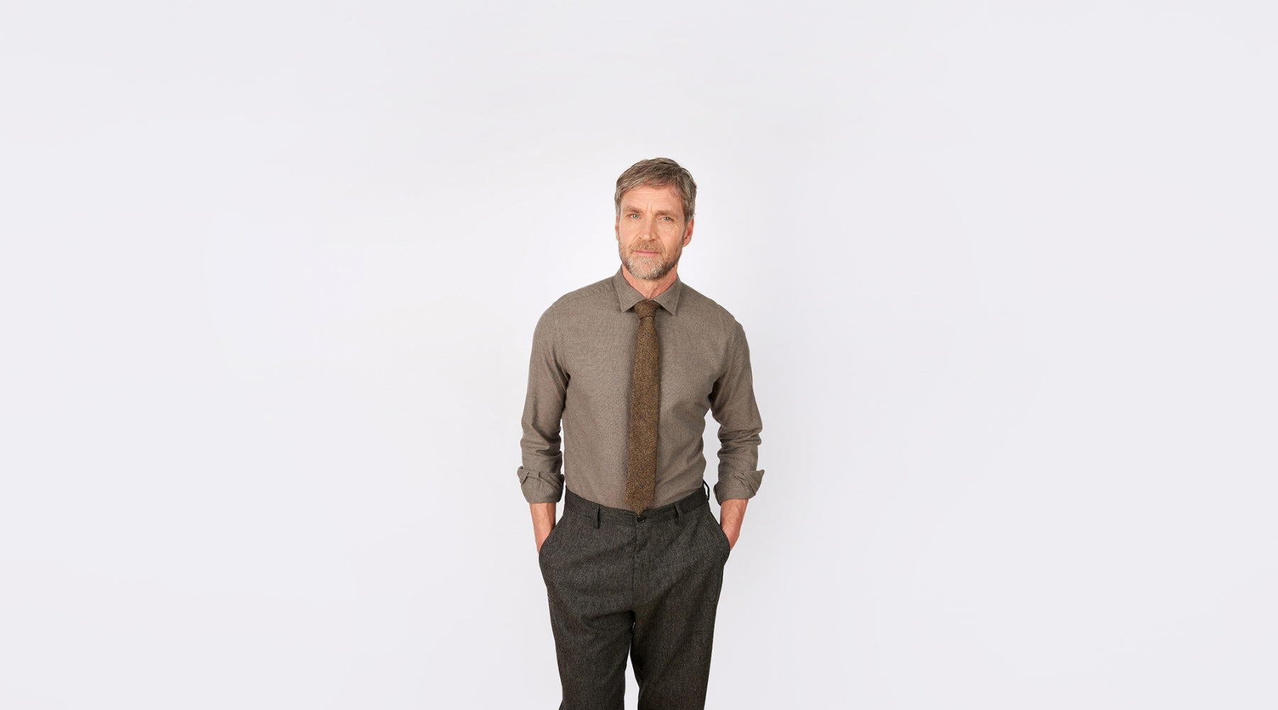 Finn wearing a Irish Tweed Brown Tie with smart casual outfit
