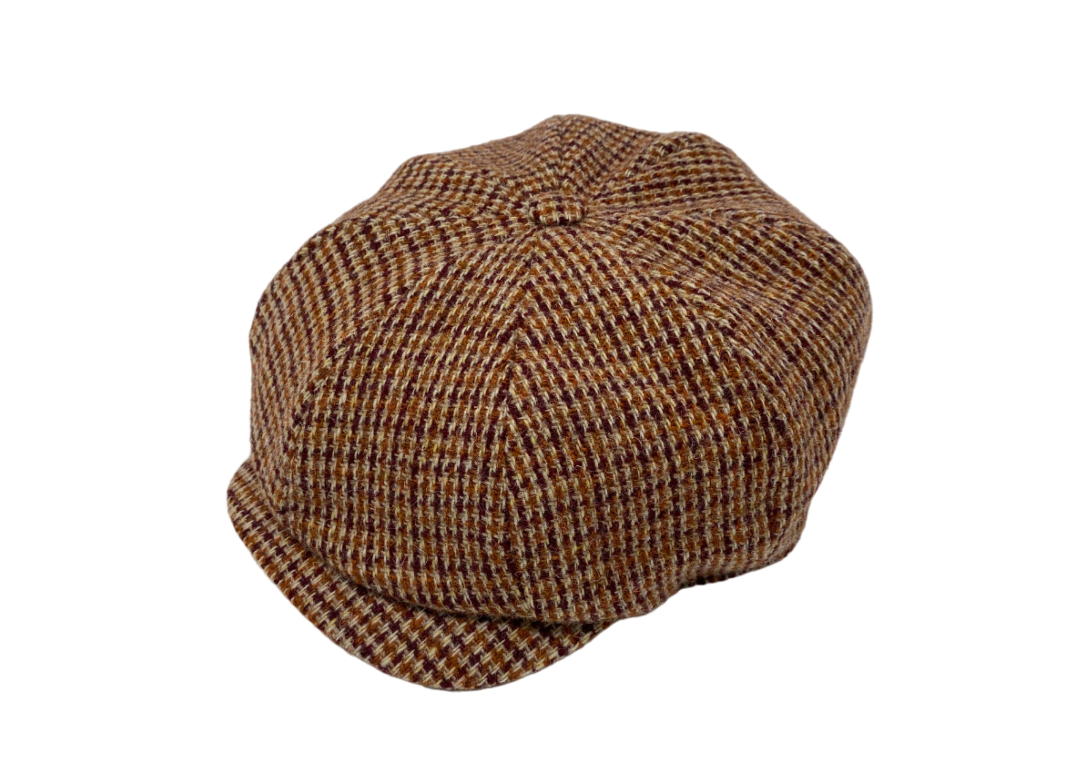 The Hanna Hats JP Cap Tweed is a brown and beige houndstooth-patterned newsboy cap with a tailored fit, round paneled crown, and short stiff brim, shown on a white background.