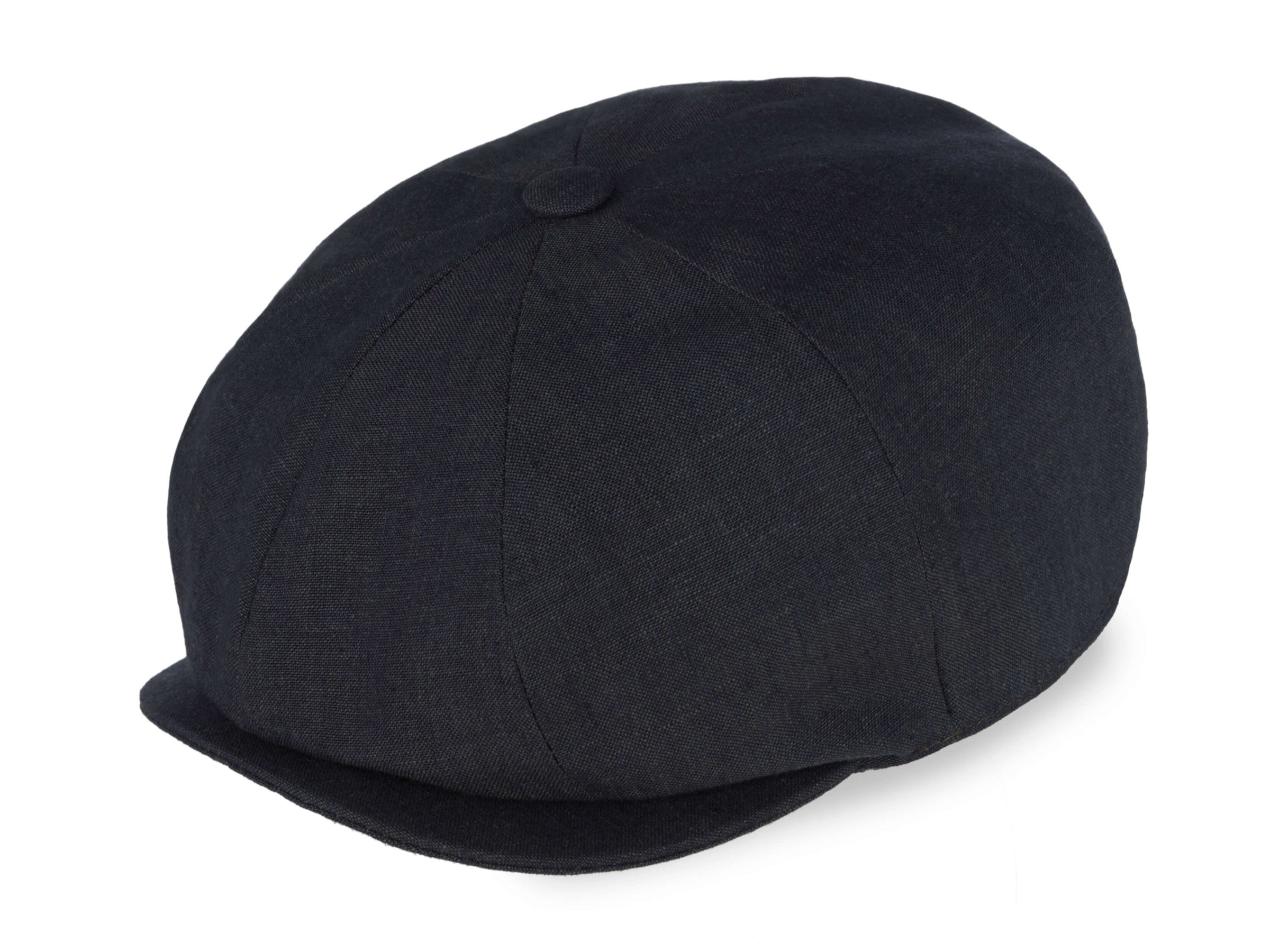 The Hanna Hats Connery Cap Linen is a dark unisex newsboy cap with a round paneled crown and short stiff brim, crafted from recycled plastic. It’s shown here against a white background.