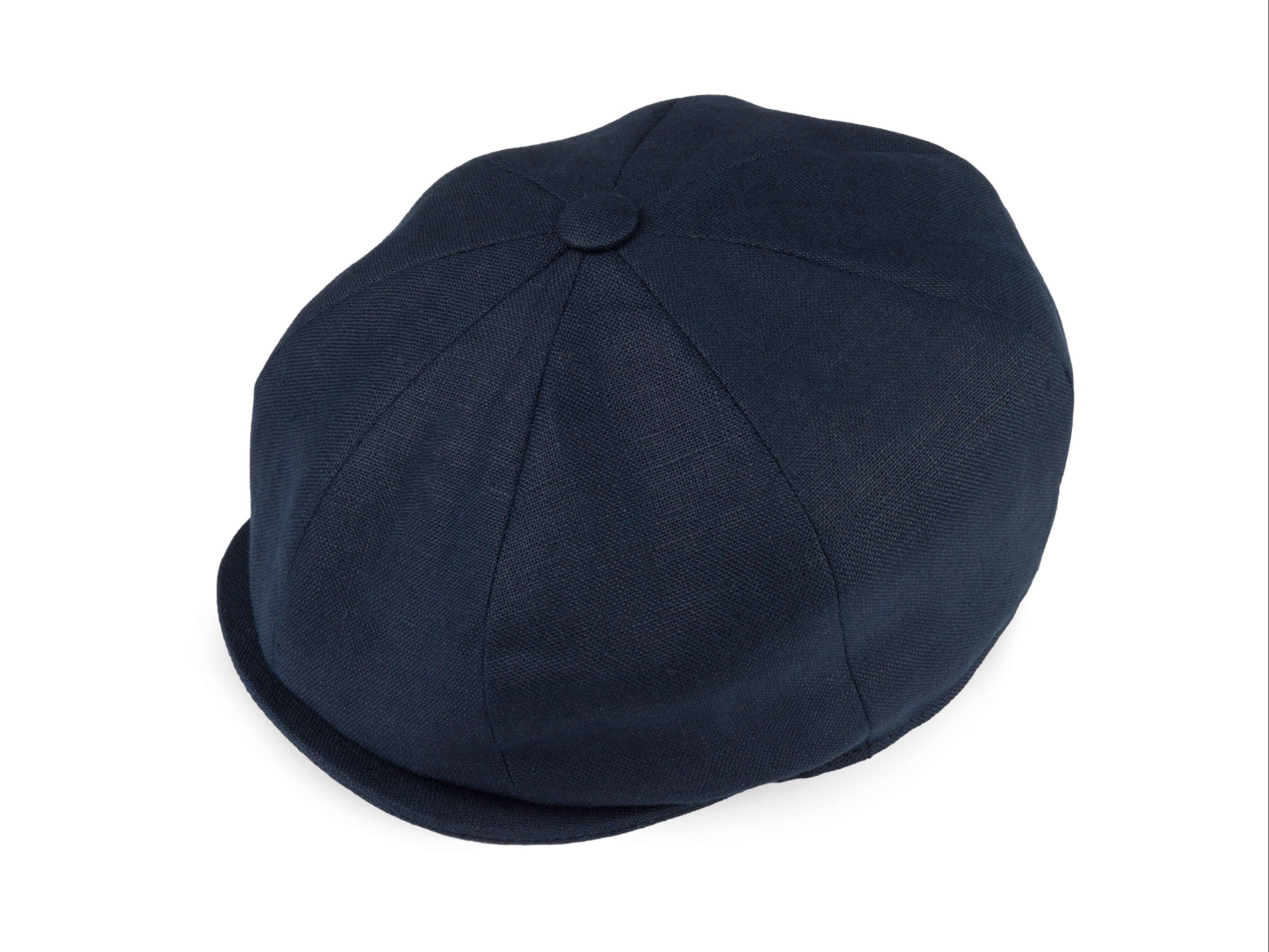 The Hanna Hats Connery Cap Linen is a dark blue unisex cap with a round paneled design and small brim, photographed on a white background.